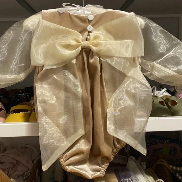 It’s not from Petit Maison Kids, romper 12-18 months.